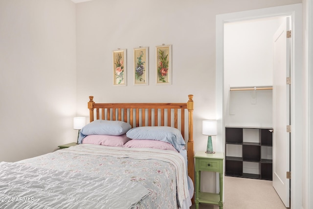 bedroom featuring a closet and carpet flooring