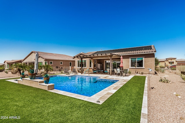 view of pool featuring a yard and a patio area