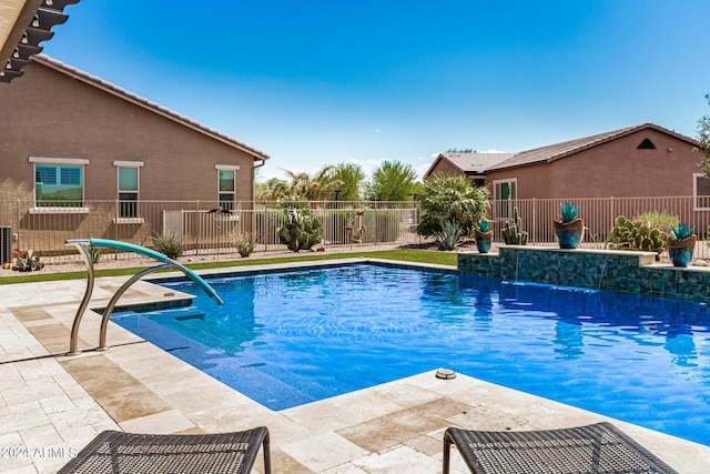 view of pool with a patio