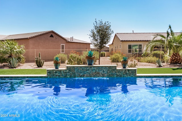 view of pool featuring pool water feature