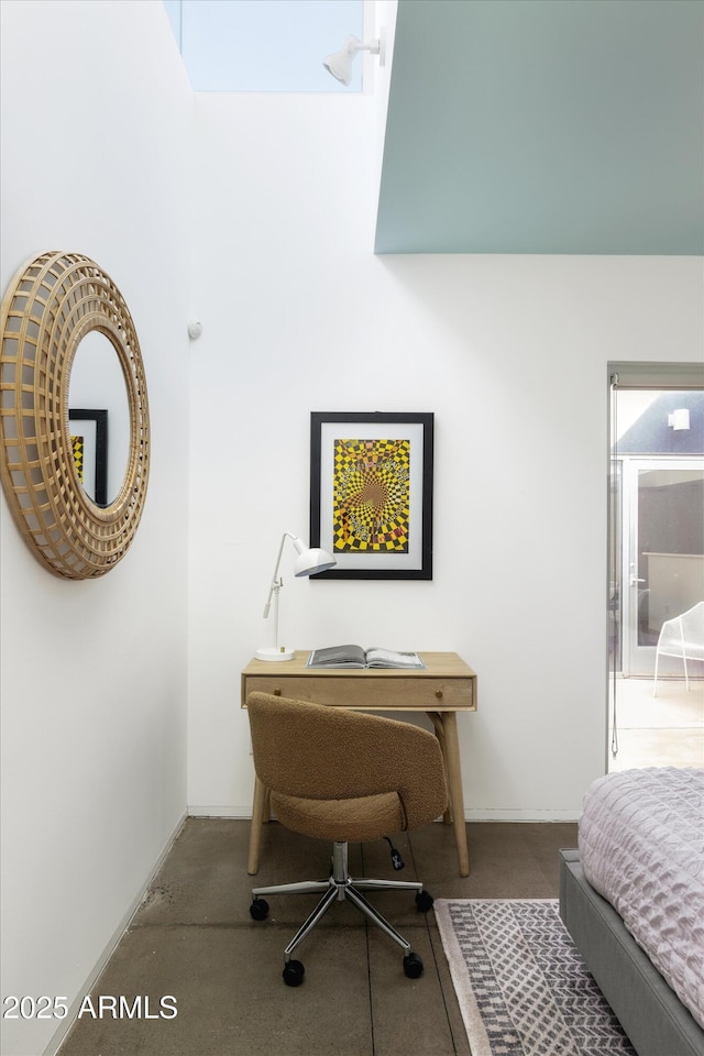 bedroom featuring baseboards