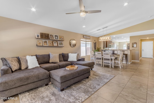 tiled living room with vaulted ceiling and ceiling fan