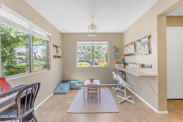 interior space with a healthy amount of sunlight and light tile patterned floors