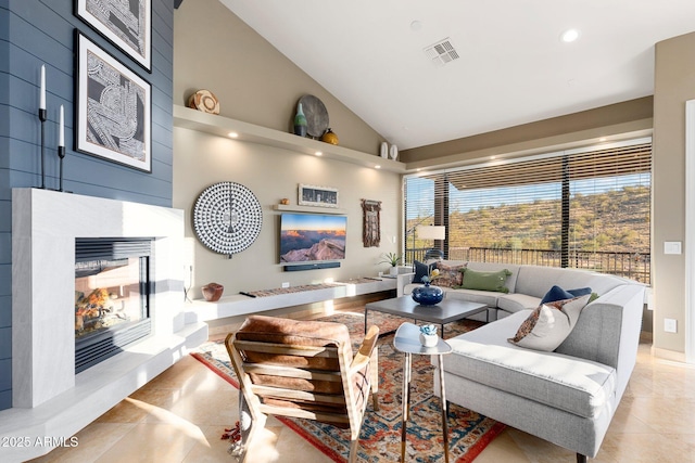 tiled living room featuring high vaulted ceiling, recessed lighting, visible vents, and a multi sided fireplace