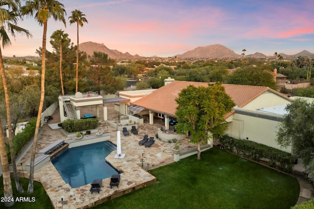 24218 N 85th St, Scottsdale, AZ 85255 - rear view of house with a lawn, stairs, a mountain view, a tiled roof, and a patio area