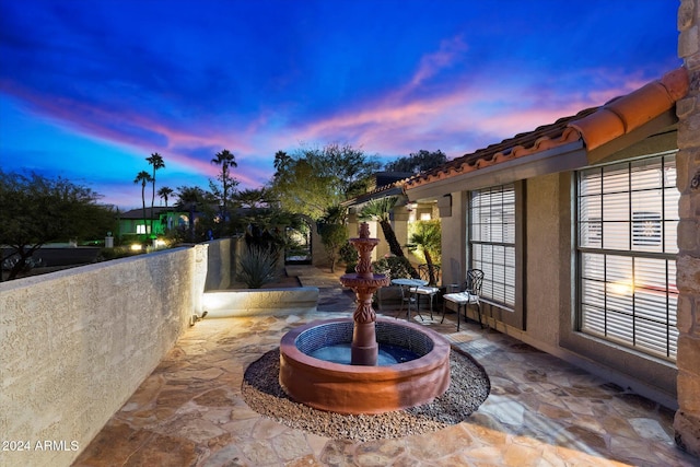 24218 N 85th St, Scottsdale, AZ 85255 - patio terrace at dusk featuring a patio