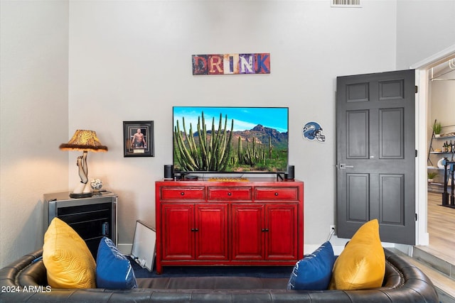 living room with dark hardwood / wood-style flooring