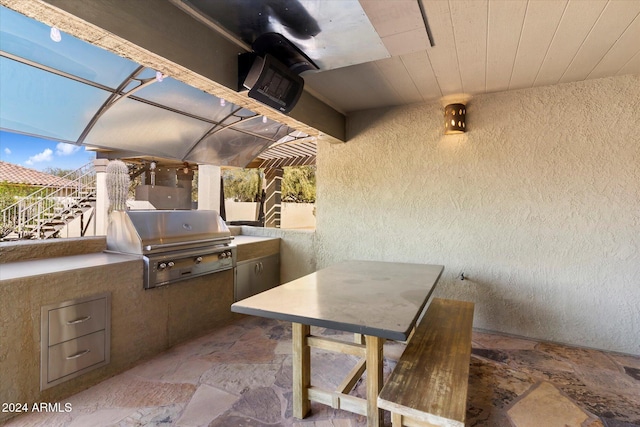 24218 N 85th St, Scottsdale, AZ 85255 - view of patio featuring area for grilling, stairs, and outdoor dining area