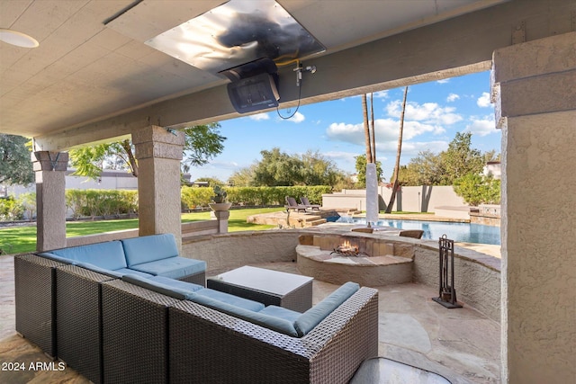 view of patio featuring a fire pit