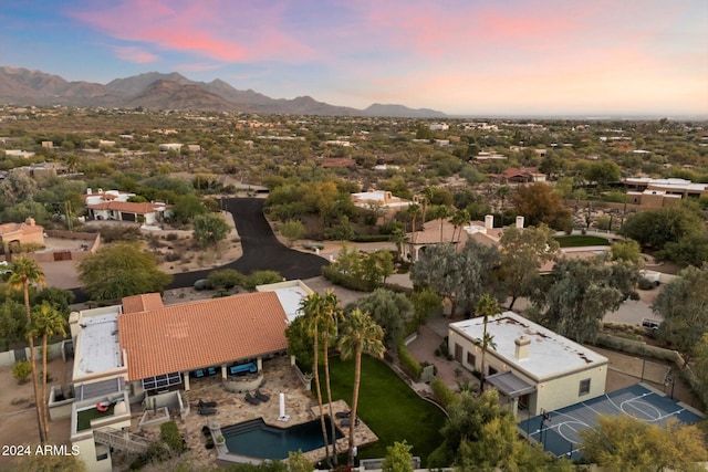 aerial view at dusk with a mountain view