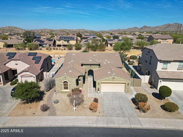 bird's eye view featuring a mountain view and a residential view