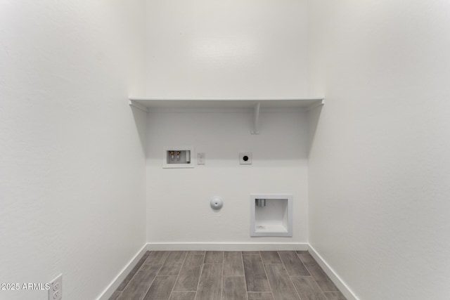 washroom featuring laundry area, wood tiled floor, gas dryer hookup, electric dryer hookup, and hookup for a washing machine