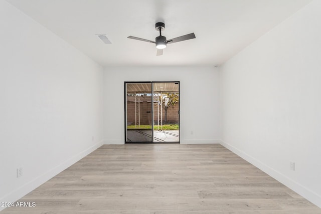 unfurnished room featuring ceiling fan and light hardwood / wood-style flooring