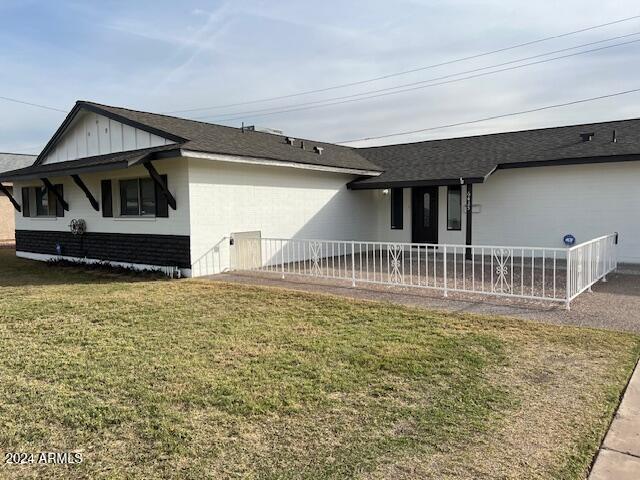 exterior space with a front lawn