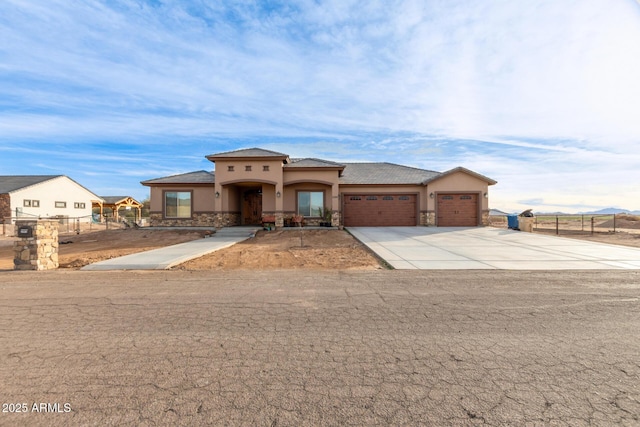 view of front of property featuring a garage