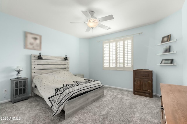 bedroom featuring baseboards, carpet floors, and a ceiling fan