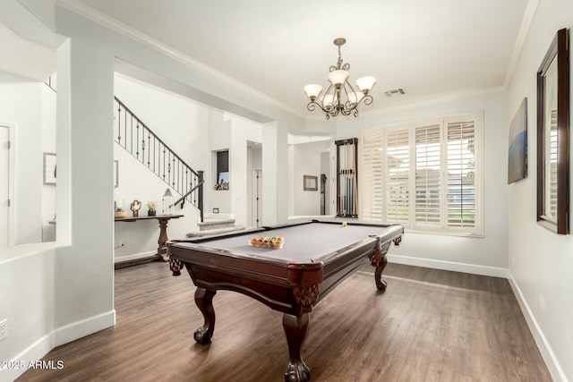 playroom featuring baseboards, wood finished floors, visible vents, and ornamental molding