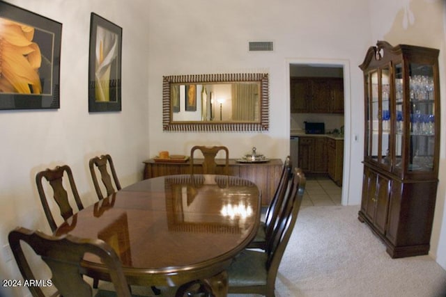 view of carpeted dining space