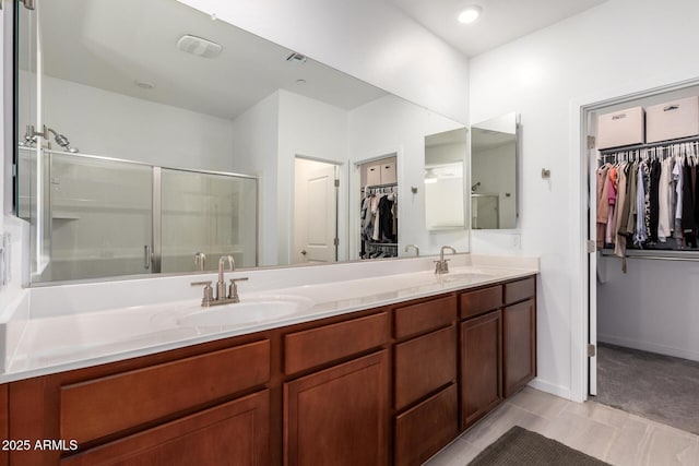 4562 S Park Grove St Unit 101, Gilbert, AZ 85297 - full bath featuring a spacious closet, double vanity, and a stall shower