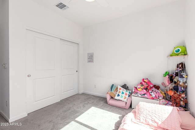 4562 S Park Grove St Unit 101, Gilbert, AZ 85297 - bedroom with carpet flooring, a closet, and ceiling fan