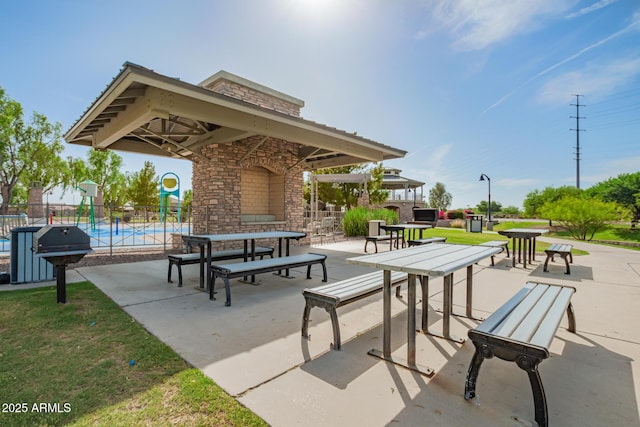 4562 S Park Grove St Unit 101, Gilbert, AZ 85297 - view of property's community with a gazebo, a patio, and a pool