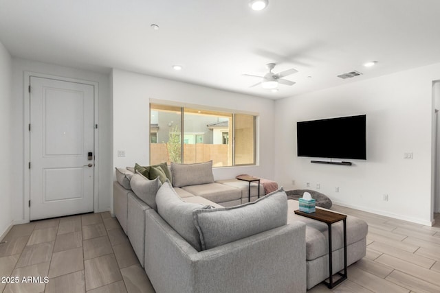 4562 S Park Grove St Unit 101, Gilbert, AZ 85297 - living area with ceiling fan, recessed lighting, and wood tiled floors