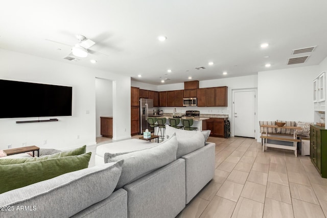 4562 S Park Grove St Unit 101, Gilbert, AZ 85297 - living area featuring recessed lighting and a ceiling fan