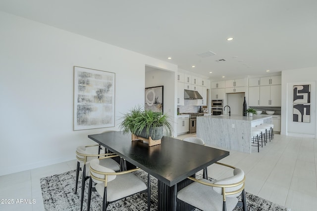 11045 N Hershey St, Surprise, AZ 85388 - dining area featuring recessed lighting, baseboards, and light tile patterned floors