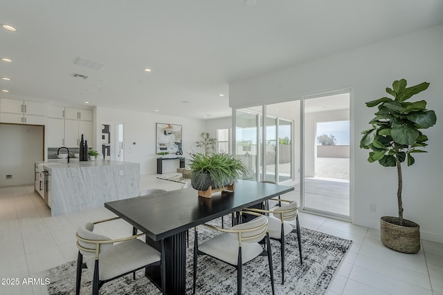 11045 N Hershey St, Surprise, AZ 85388 - dining space with recessed lighting and light tile patterned flooring