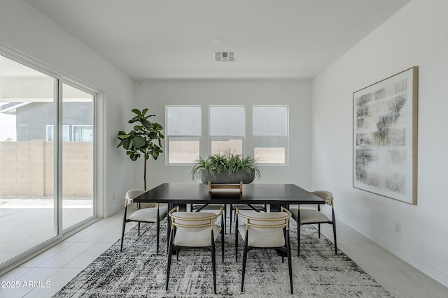 11045 N Hershey St, Surprise, AZ 85388 - dining room featuring light tile patterned floors