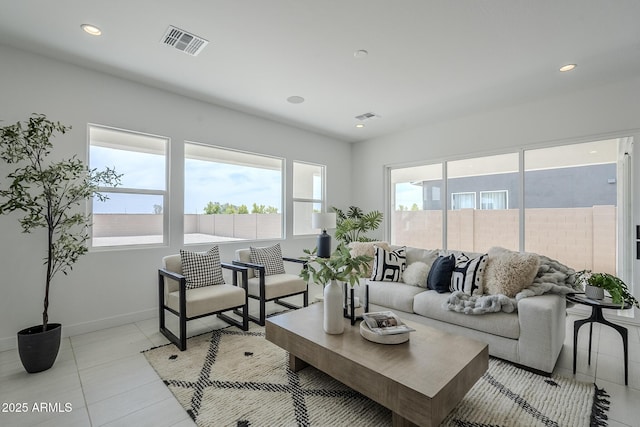 11045 N Hershey St, Surprise, AZ 85388 - living area with baseboards, light tile patterned flooring, and recessed lighting