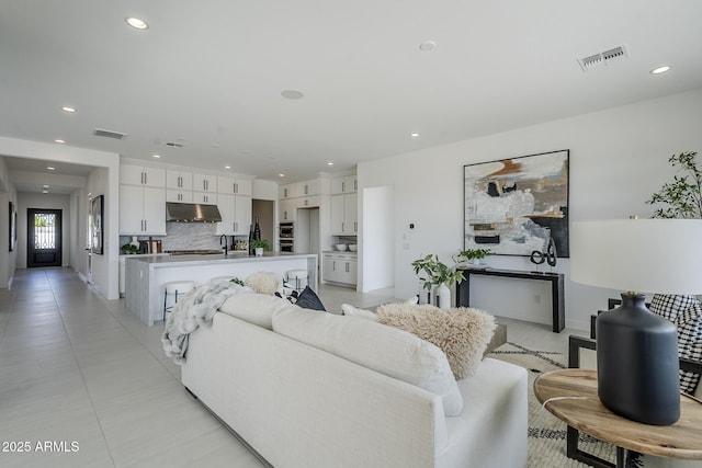 11045 N Hershey St, Surprise, AZ 85388 - living room featuring recessed lighting