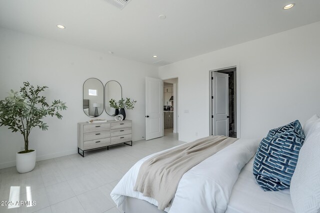 11045 N Hershey St, Surprise, AZ 85388 - bedroom with recessed lighting, baseboards, and light tile patterned floors