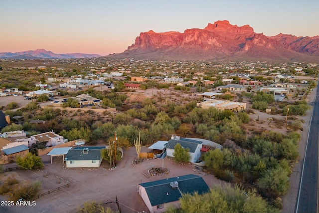 aerial view at dusk with a mountain view