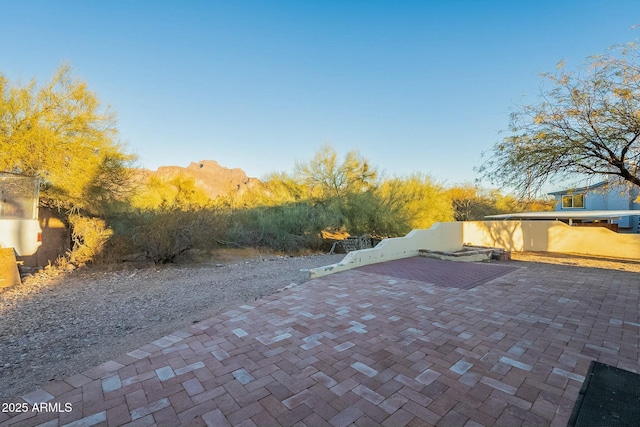 view of patio with a mountain view