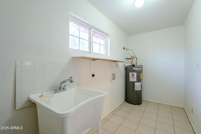 laundry area featuring hookup for a washing machine, electric water heater, hookup for an electric dryer, a sink, and laundry area