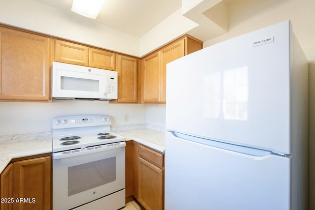 kitchen featuring white appliances