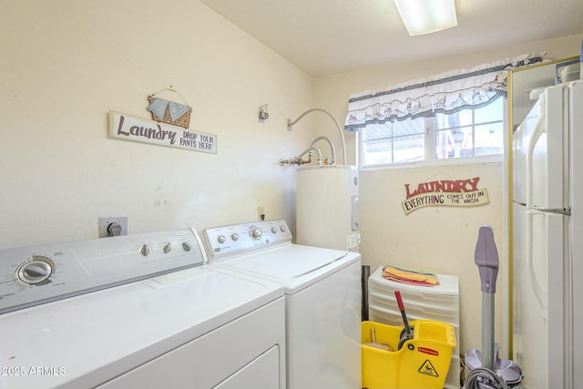 laundry area with independent washer and dryer and water heater