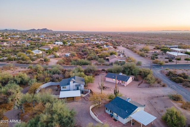 aerial view at dusk with a mountain view