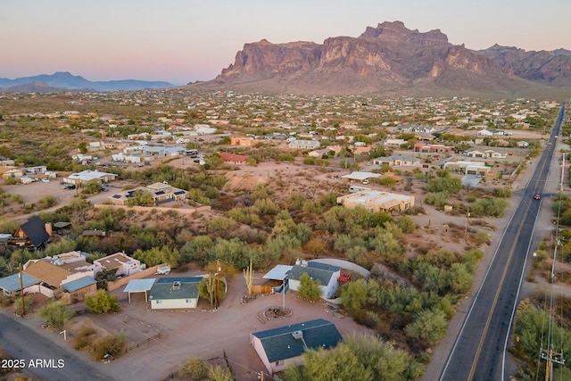 drone / aerial view with a residential view and a mountain view