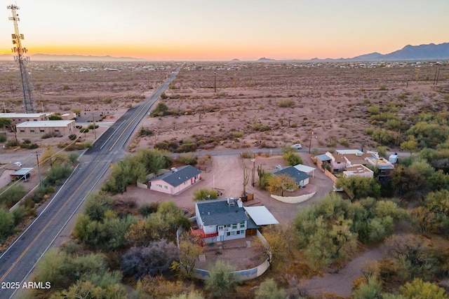 aerial view at dusk with a mountain view