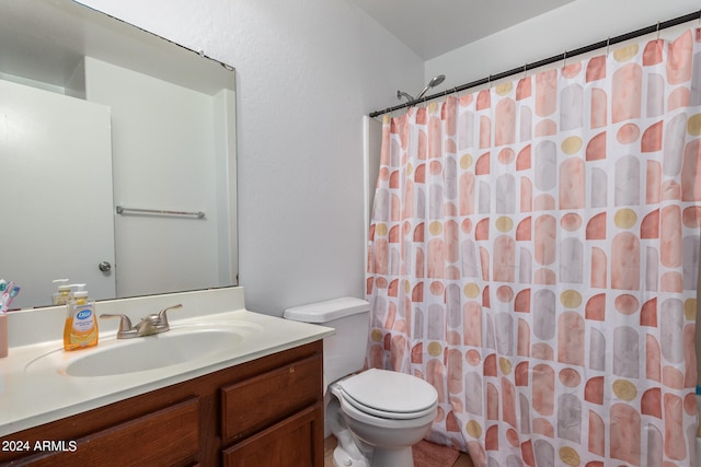 bathroom featuring vanity, tile patterned floors, toilet, and a shower with shower curtain