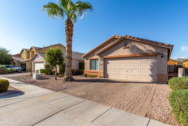 single story home with a garage