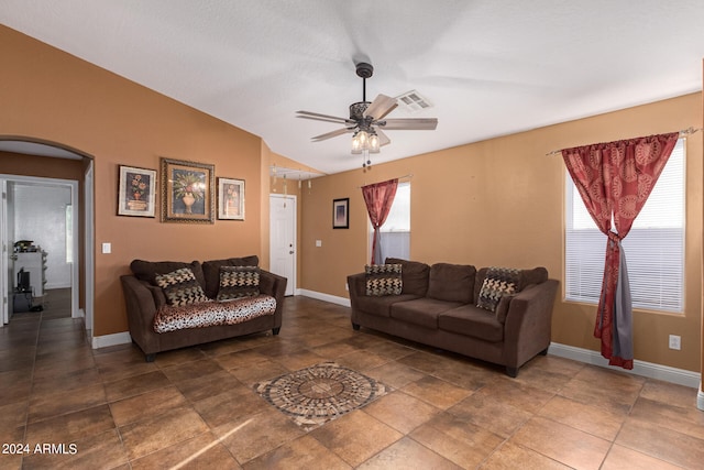 living room featuring lofted ceiling and ceiling fan