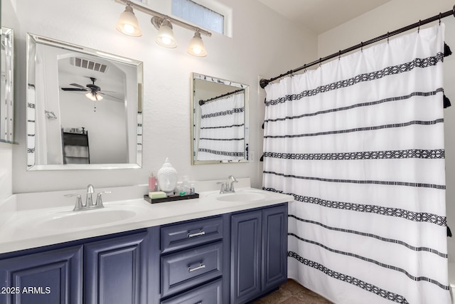 bathroom with vanity and ceiling fan