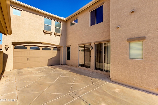 exterior space with a garage