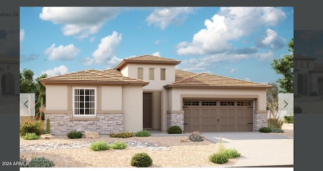 prairie-style house featuring a garage