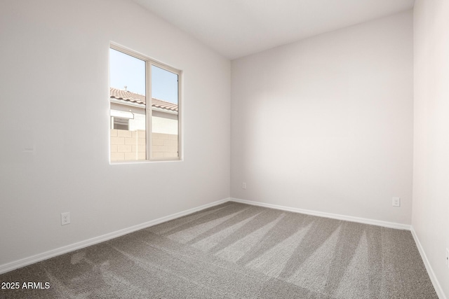 spare room with carpet