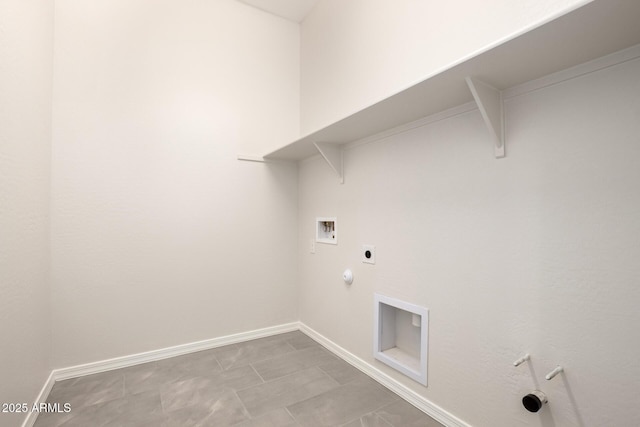 clothes washing area with hookup for an electric dryer, hookup for a gas dryer, and washer hookup