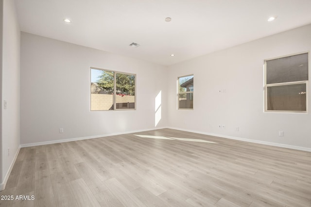 empty room with light wood-type flooring